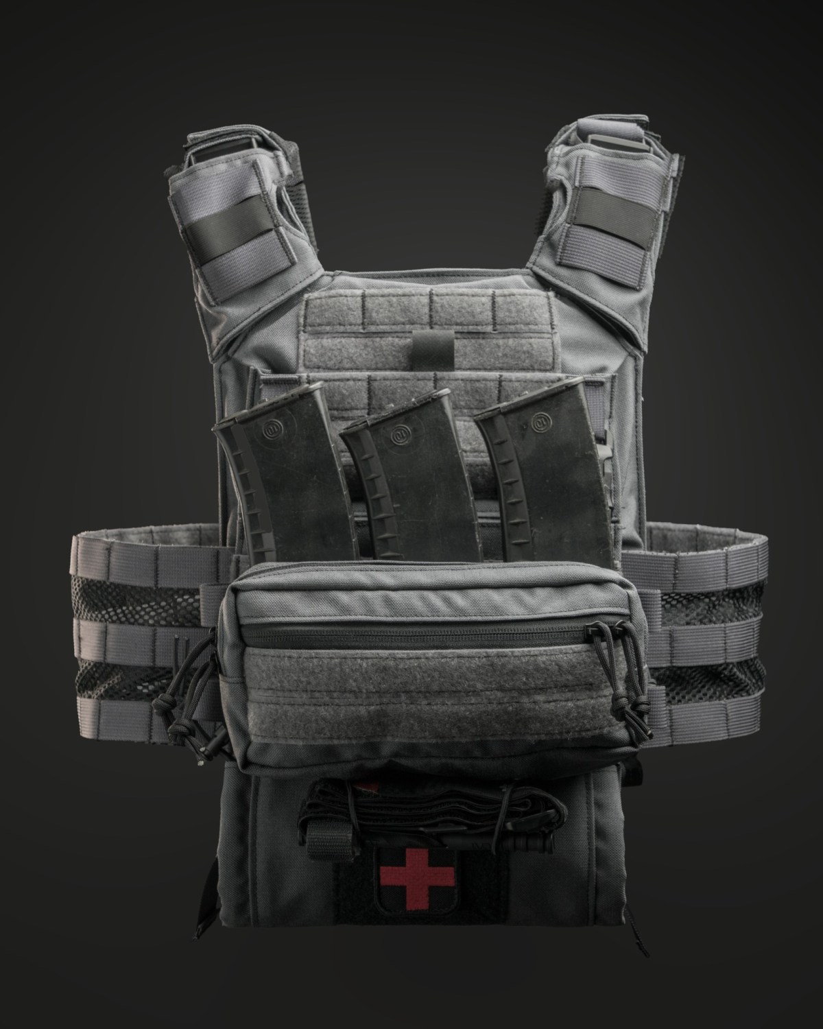 Gray Man Kit Valkyrie plate carrier in Wolf Gray with MK I GP Placard holding three magazines and an IFAK Med Sleeve Dangler for tactical readiness.